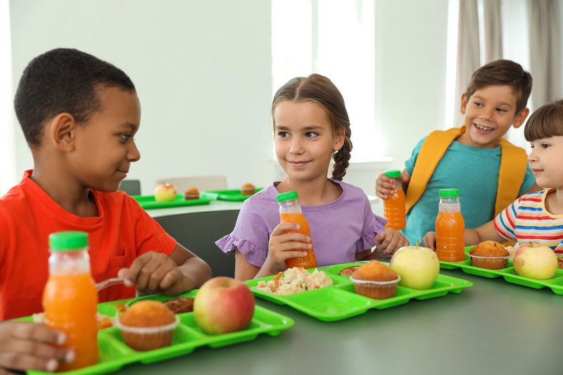 Children eating school lunch