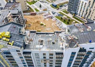 roof construction in progress. aerial view of modern building construction site