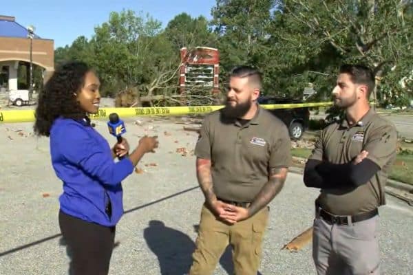 Dan & Cam speaking with a reporter about the tornado in NC