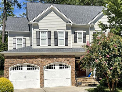 front view of a home with a two car garage